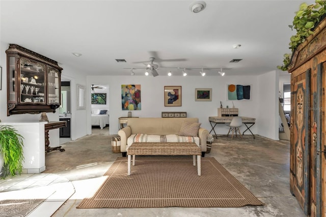 living room featuring ceiling fan