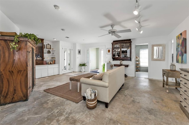 living room with ceiling fan