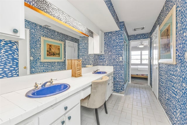 bathroom with vanity and ceiling fan