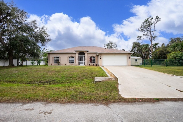 view of front facade with a garage and a front lawn