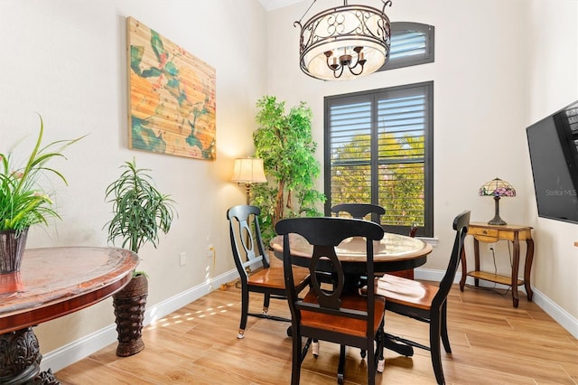 dining space with light wood-type flooring