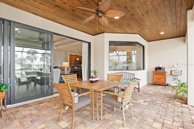 interior space featuring crown molding, ceiling fan with notable chandelier, and wood ceiling