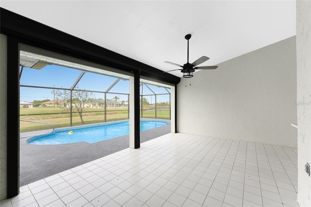 view of swimming pool featuring ceiling fan