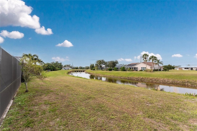 view of yard featuring a water view