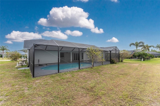 exterior space with a lanai and a yard