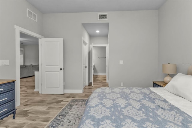 bedroom featuring light wood-type flooring