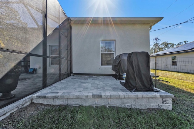 rear view of house with a patio area and a yard