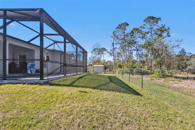 view of yard with a lanai