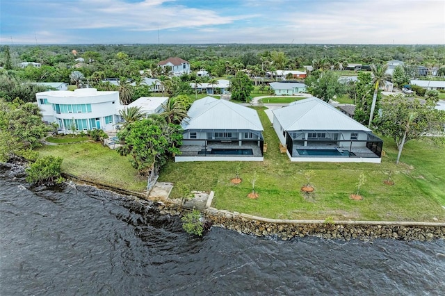 drone / aerial view featuring a water view