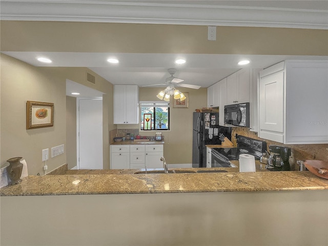 kitchen featuring black appliances, ceiling fan, white cabinetry, and sink