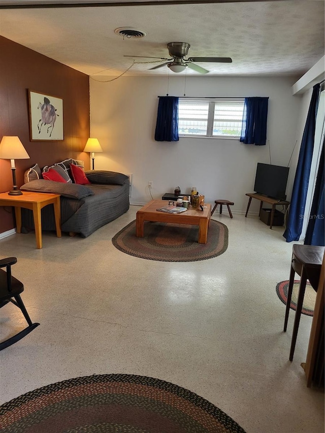 living room featuring ceiling fan