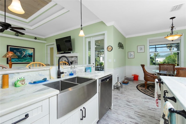 kitchen featuring white cabinetry, dishwasher, crown molding, and light stone countertops