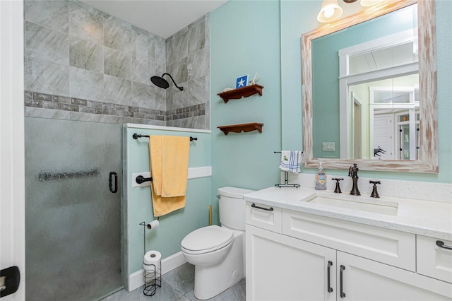 bathroom featuring walk in shower, tile patterned flooring, vanity, and toilet