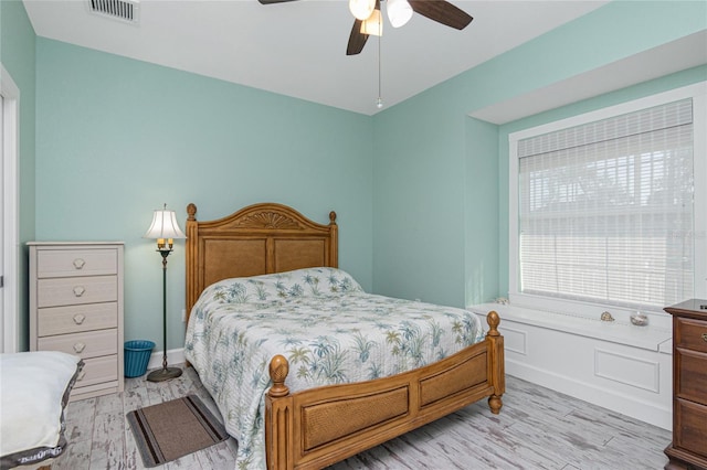 bedroom featuring ceiling fan and light hardwood / wood-style flooring