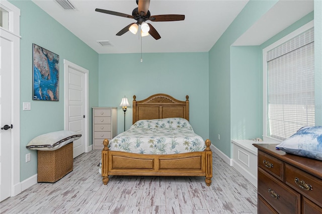 bedroom featuring ceiling fan and light hardwood / wood-style floors