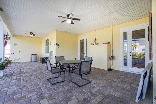 view of patio with ceiling fan and french doors