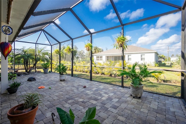 view of patio / terrace with a lanai