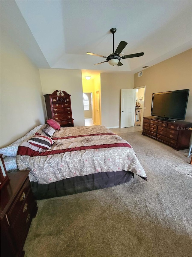 carpeted bedroom with ceiling fan