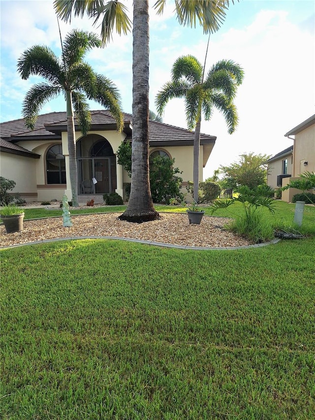 view of front of house with a front yard