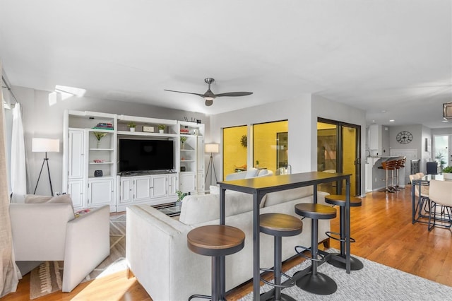 interior space featuring light hardwood / wood-style flooring and ceiling fan