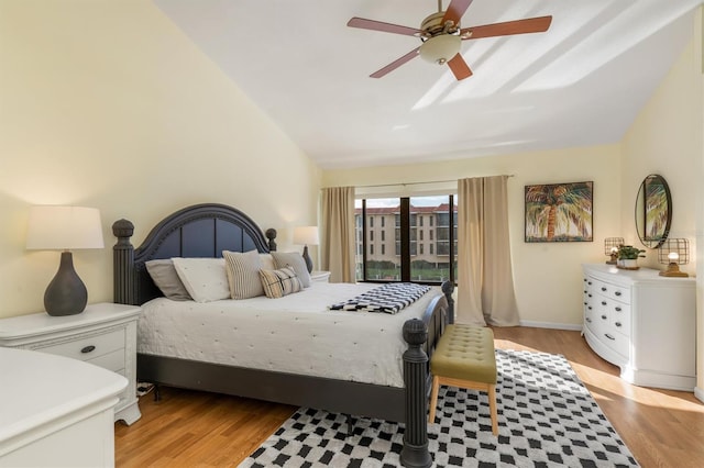 bedroom featuring access to exterior, ceiling fan, lofted ceiling, and light wood-type flooring