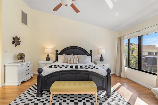 bedroom featuring ceiling fan and light hardwood / wood-style floors