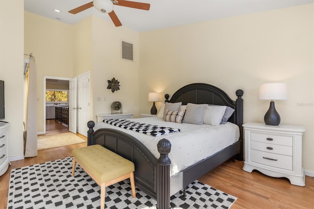 bedroom featuring ceiling fan and light wood-type flooring