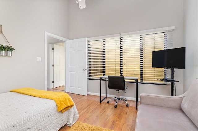 bedroom with light wood-type flooring