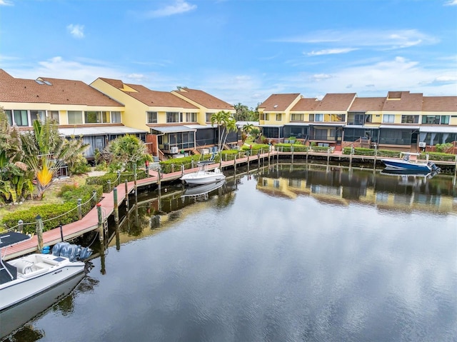 view of water feature with a dock