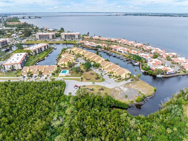 birds eye view of property featuring a water view