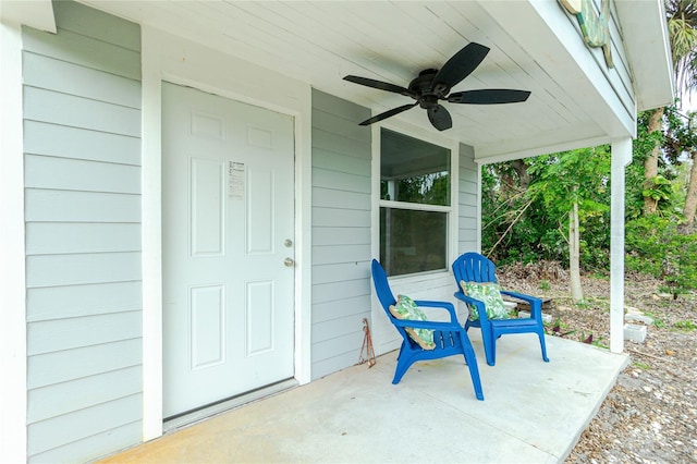 view of patio featuring ceiling fan