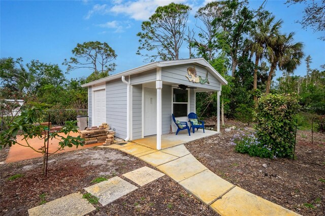 view of outdoor structure with a garage