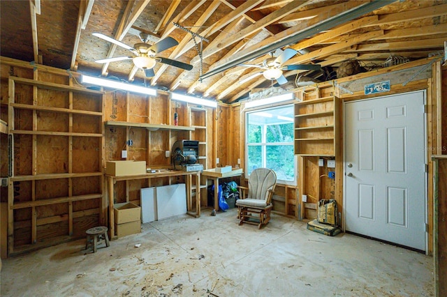 interior space featuring ceiling fan