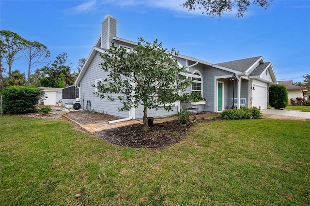 view of home's exterior featuring a garage and a lawn