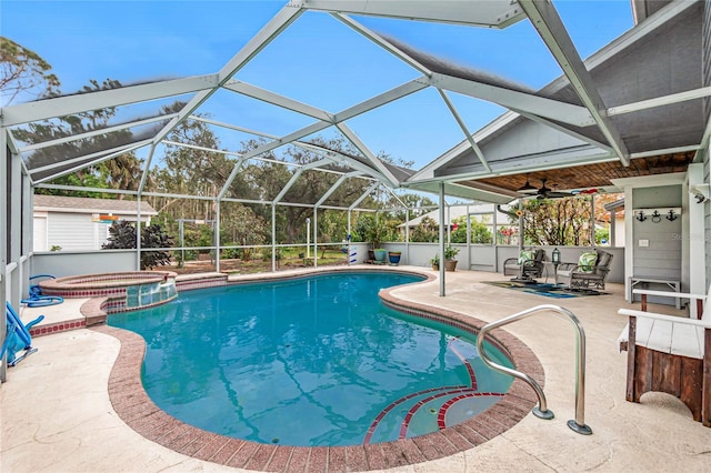 view of pool featuring a lanai, a patio area, ceiling fan, and an in ground hot tub