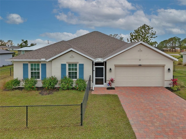 single story home featuring a front lawn and a garage