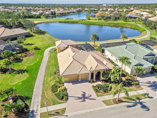 bird's eye view with a water view