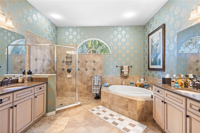 bathroom with separate shower and tub and vanity