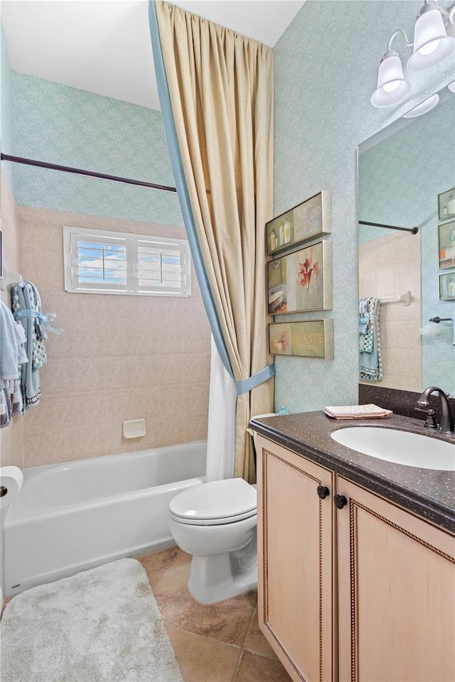 full bathroom featuring vanity, tile patterned flooring, shower / bathtub combination with curtain, and toilet