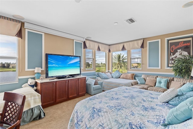 bedroom with light colored carpet