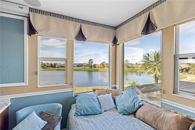 bedroom with a water view