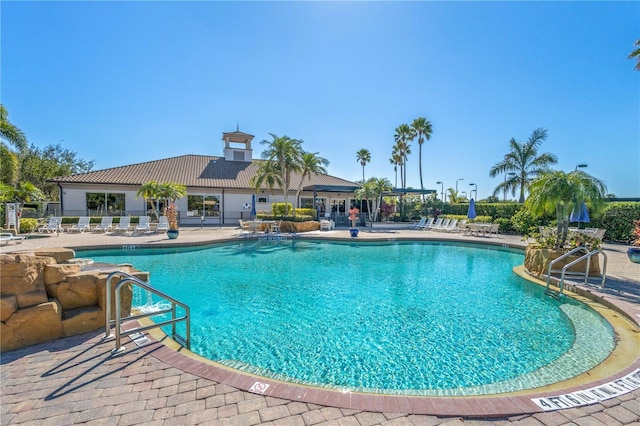 view of swimming pool featuring a patio