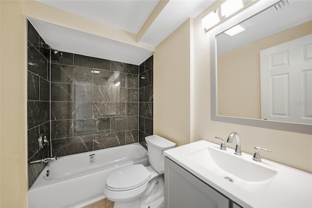 full bathroom with tile patterned floors, vanity, toilet, and tiled shower / bath