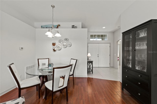 dining room featuring wood-type flooring