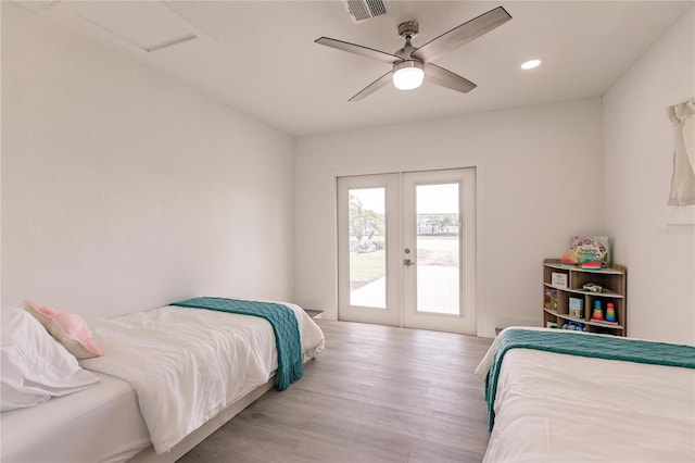 bedroom featuring french doors, access to outside, ceiling fan, and light hardwood / wood-style floors