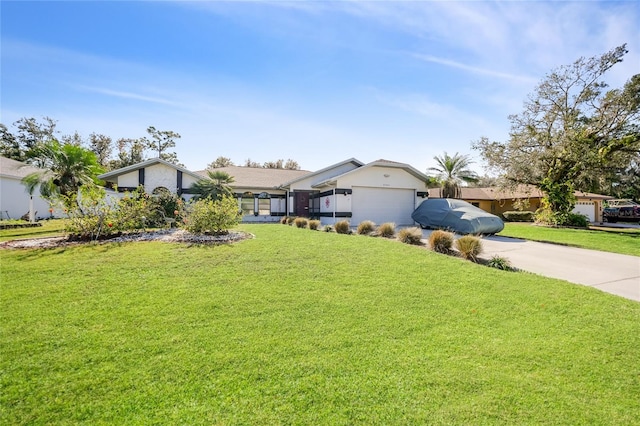 exterior space with a front yard and a garage