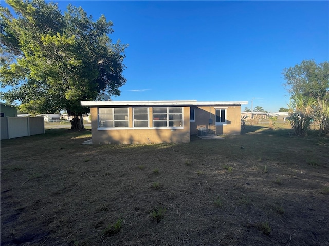 view of property exterior featuring a yard