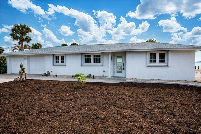 ranch-style house with a garage