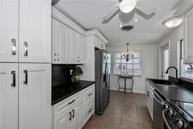 kitchen with stainless steel refrigerator with ice dispenser, sink, light tile patterned flooring, white cabinets, and dishwashing machine