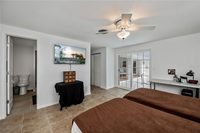 bedroom with ceiling fan, ensuite bathroom, a closet, and access to exterior